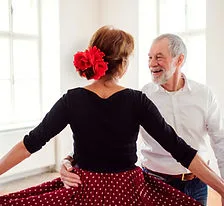 A couple ballroom dancing together