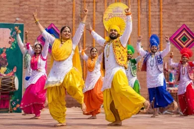 Bhangra dancers in colourful traditional dress