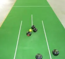 Woods on a short-mat bowls green