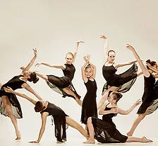 A youth theatre troupe mid-performance