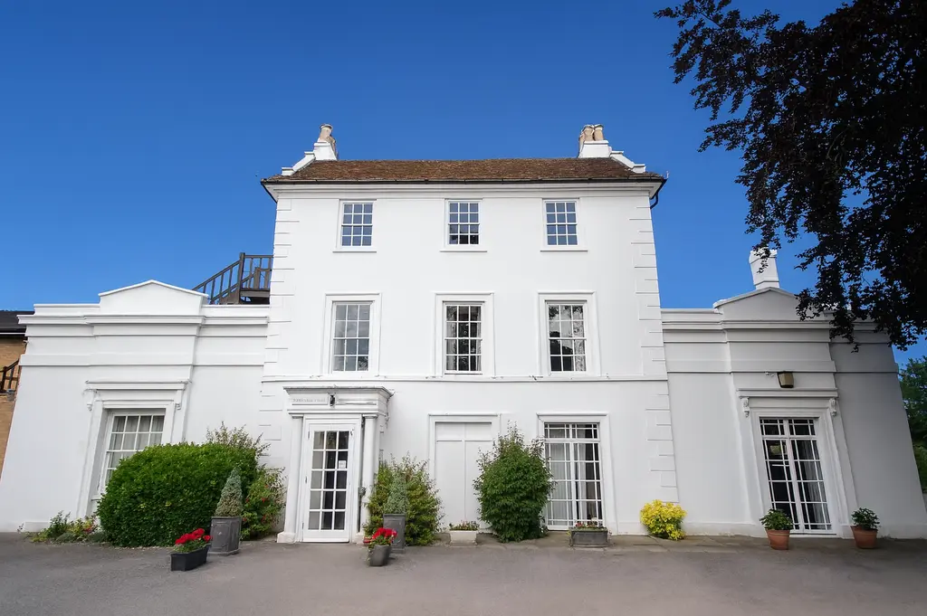The Memorial Centre’s white Georgian building on a sunny day